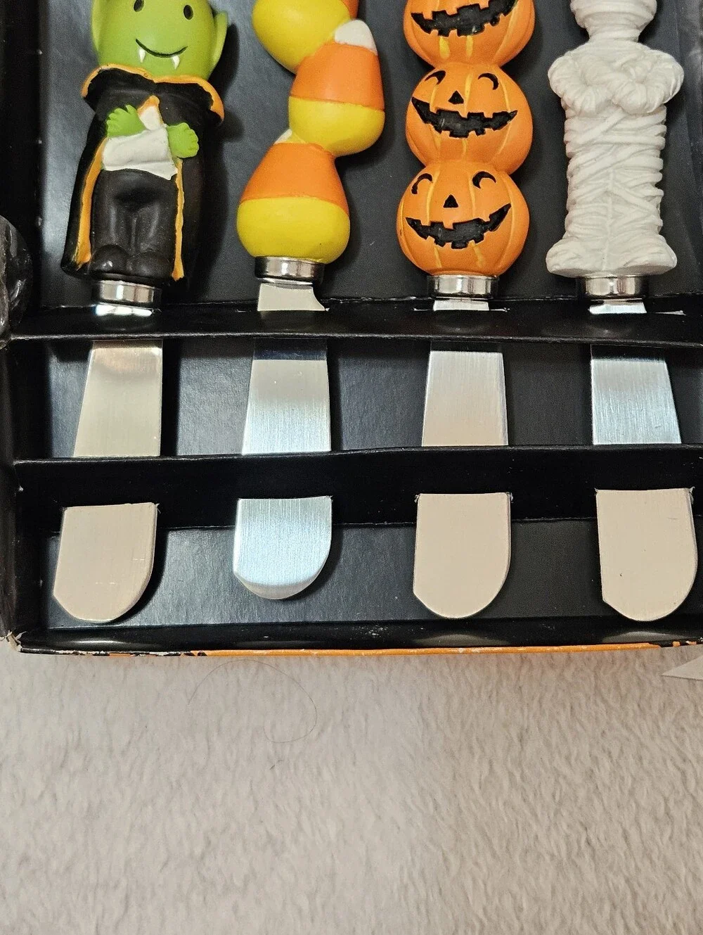 The Pier 1 Imports Halloween Canape Knife Set (4) featuring a spooky Halloween